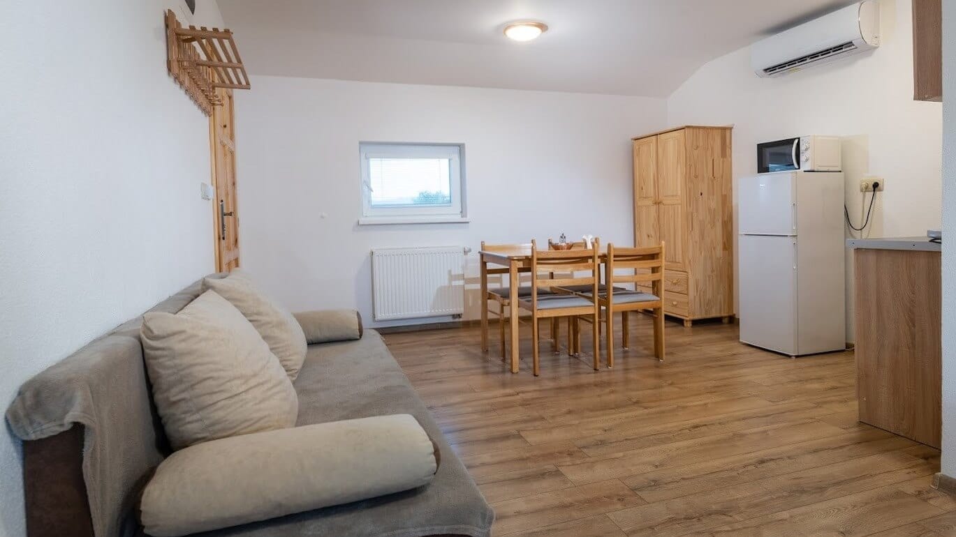 a living room with a couch and a table