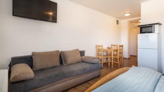 a living room with a couch and table