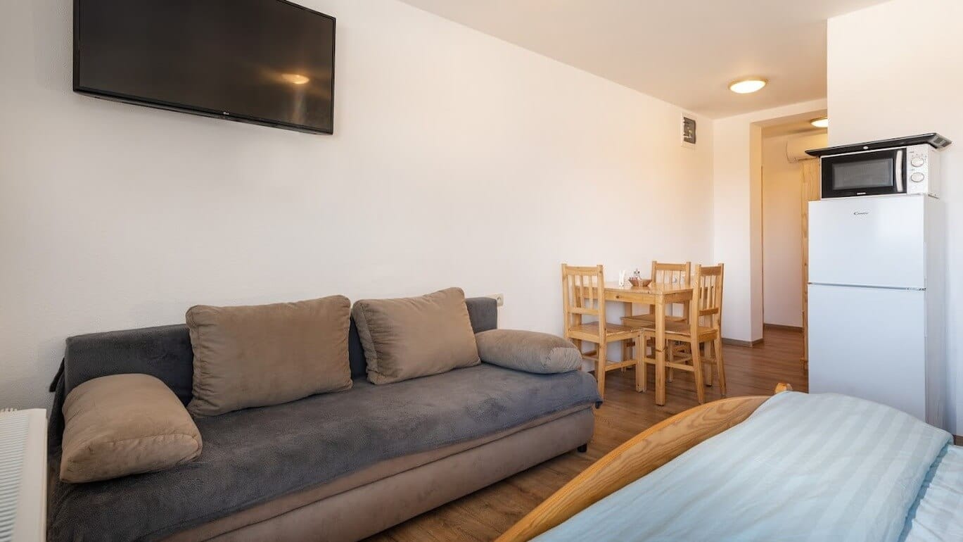 a living room with a couch and table