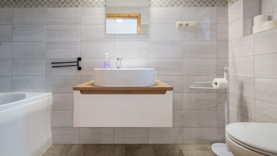 a bathroom with a sink and toilet