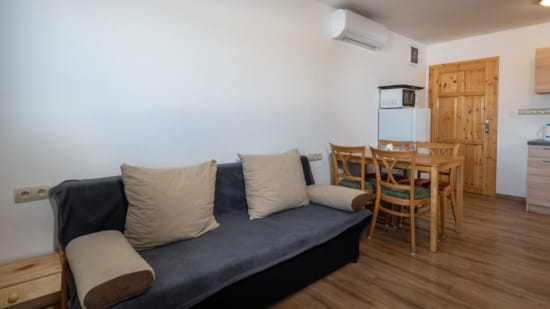 a living room with a couch and table