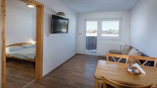 a room with a bed and a table