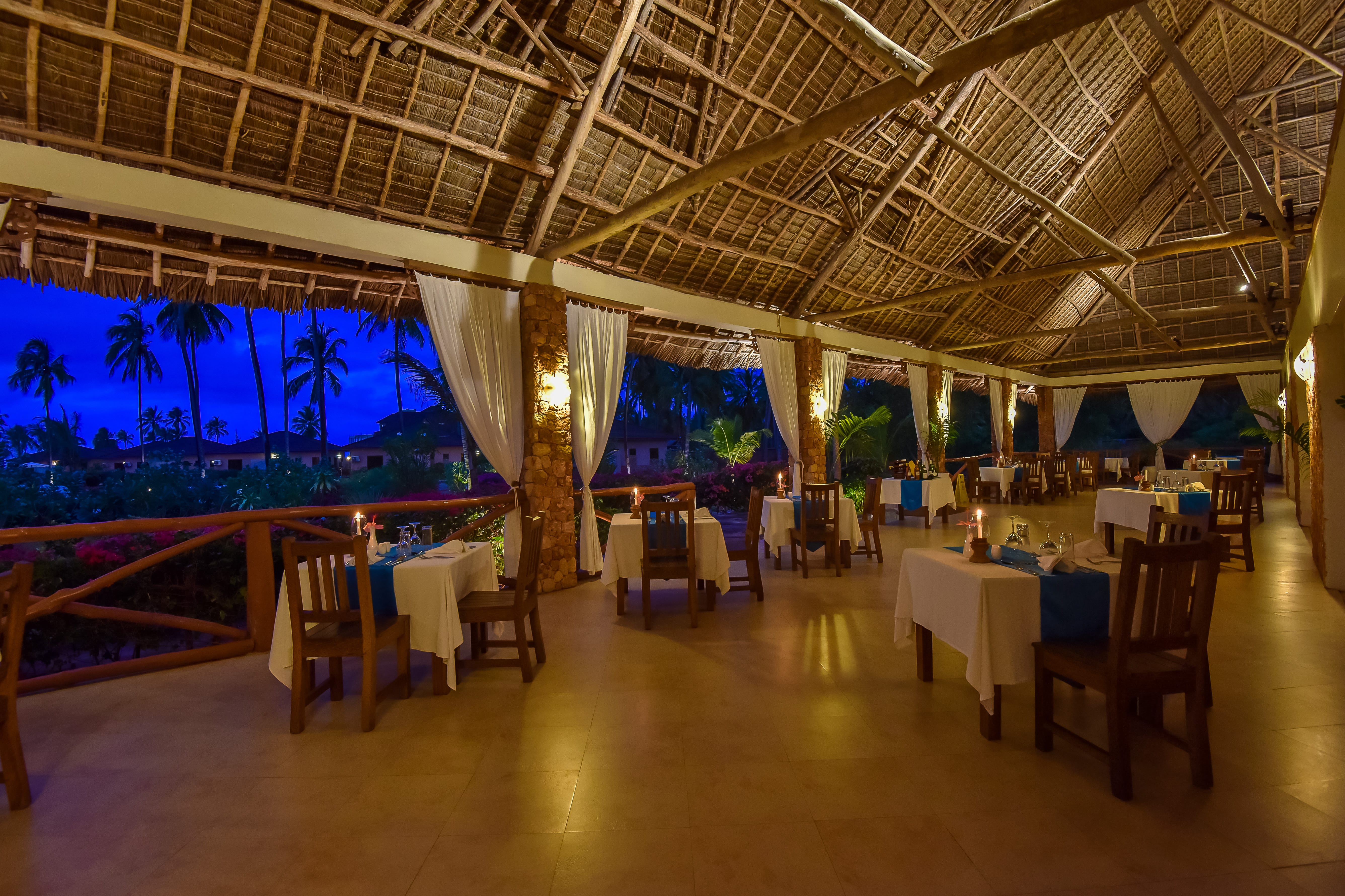 a room with tables and chairs