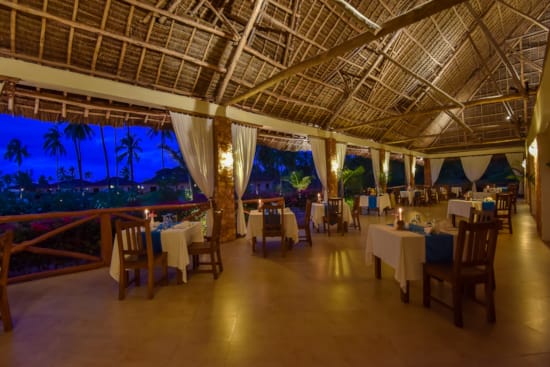 a room with tables and chairs