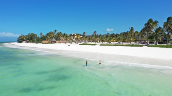 a beach with people on it
