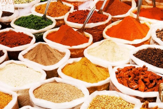 a group of bowls full of food