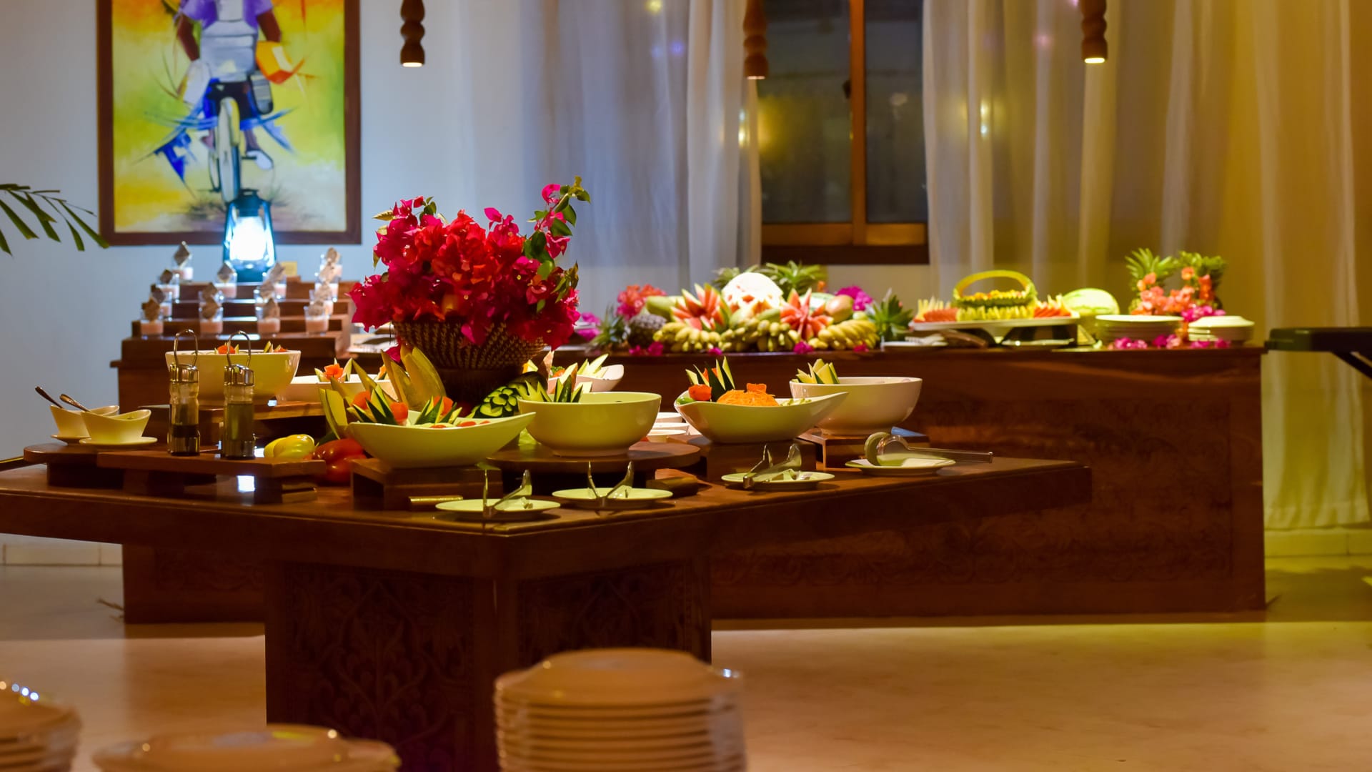 a table with food and flowers on it