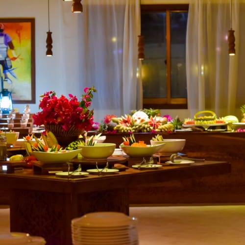 a table with food and flowers on it