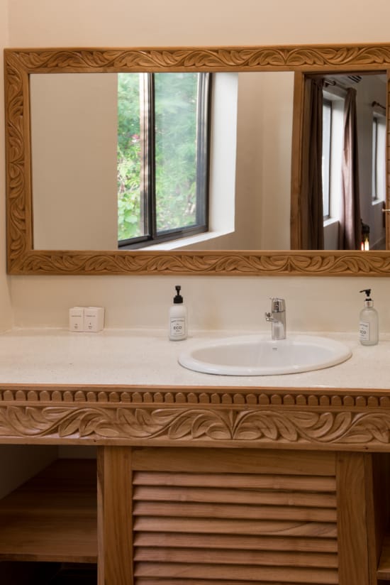 a bathroom with a large mirror