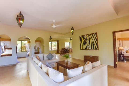 a living room with a couch and a table