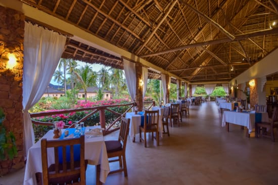 a room with tables and chairs
