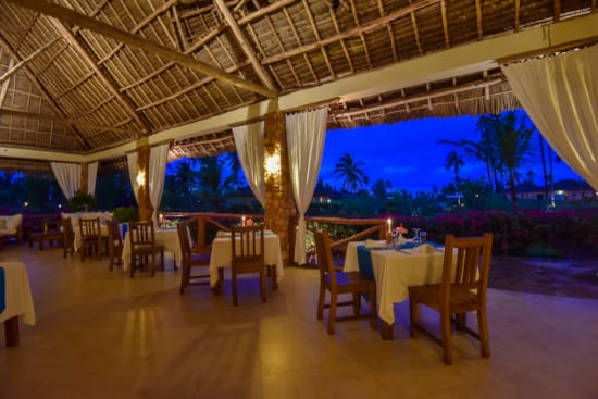 a room with tables and chairs