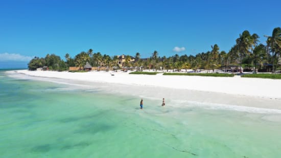 a beach with people on it