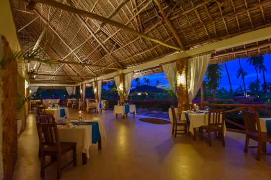 a room with tables and chairs