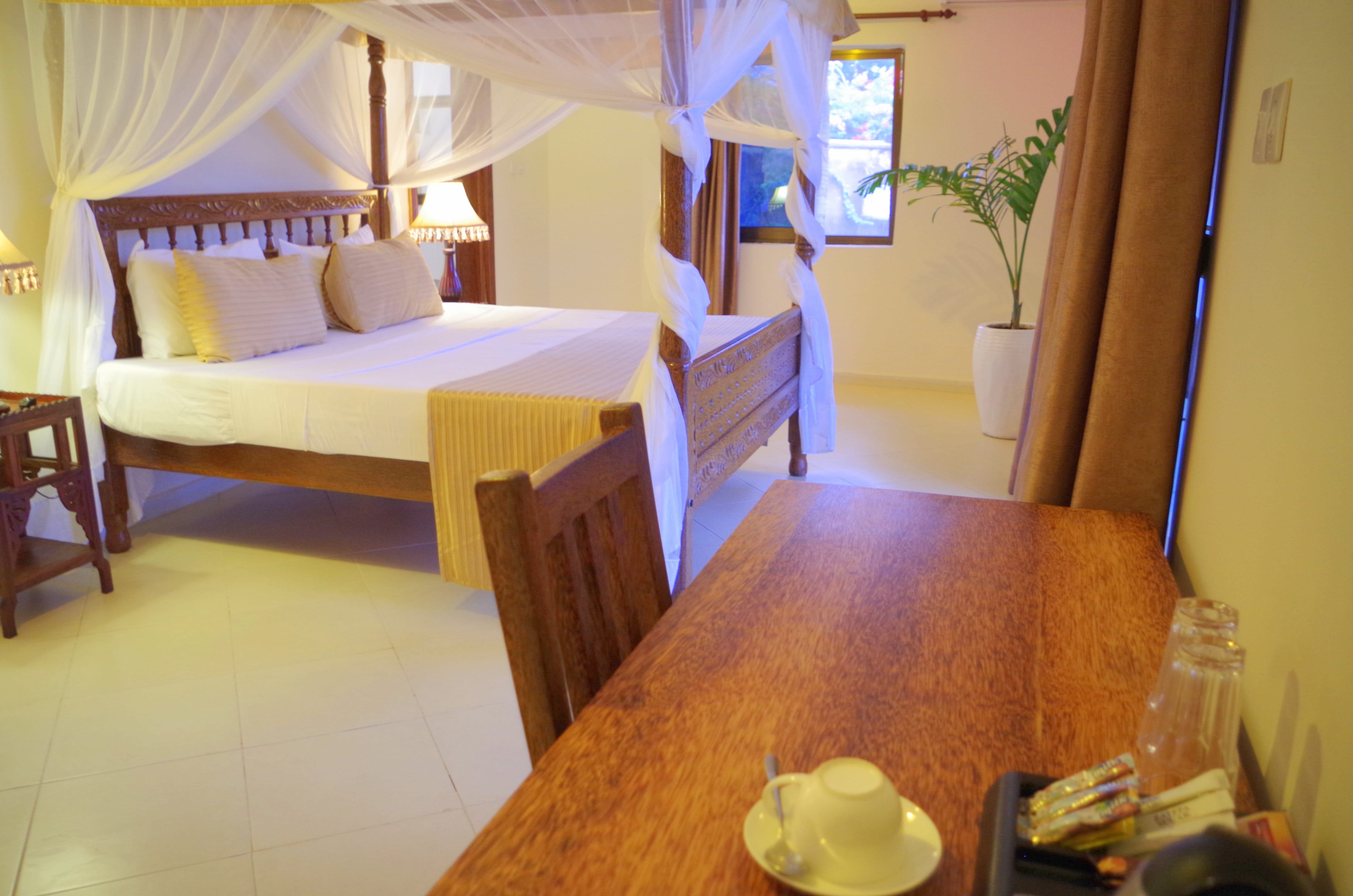 a hotel room with two beds