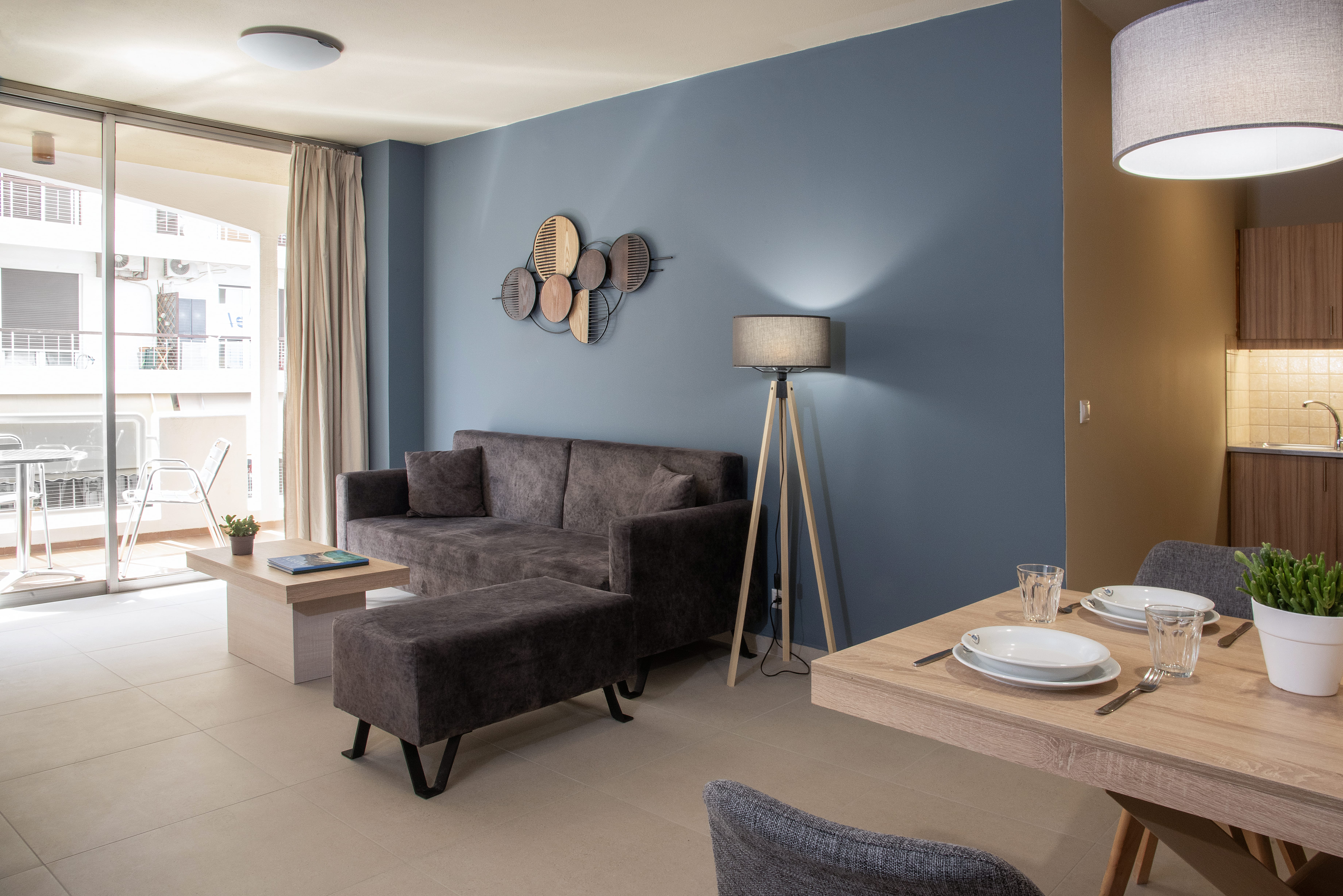 a living room with a couch and a table