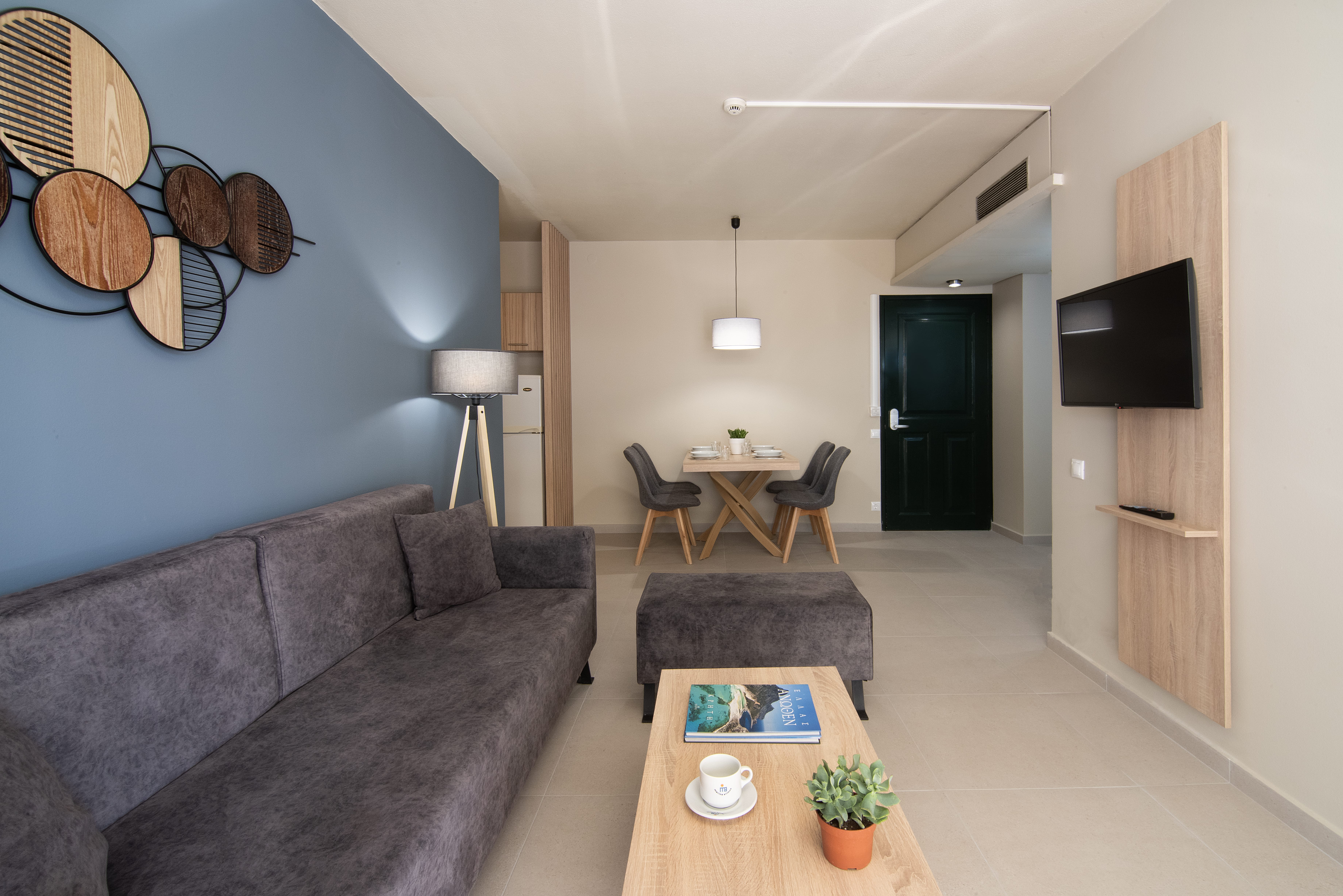 a living room with a couch and a table