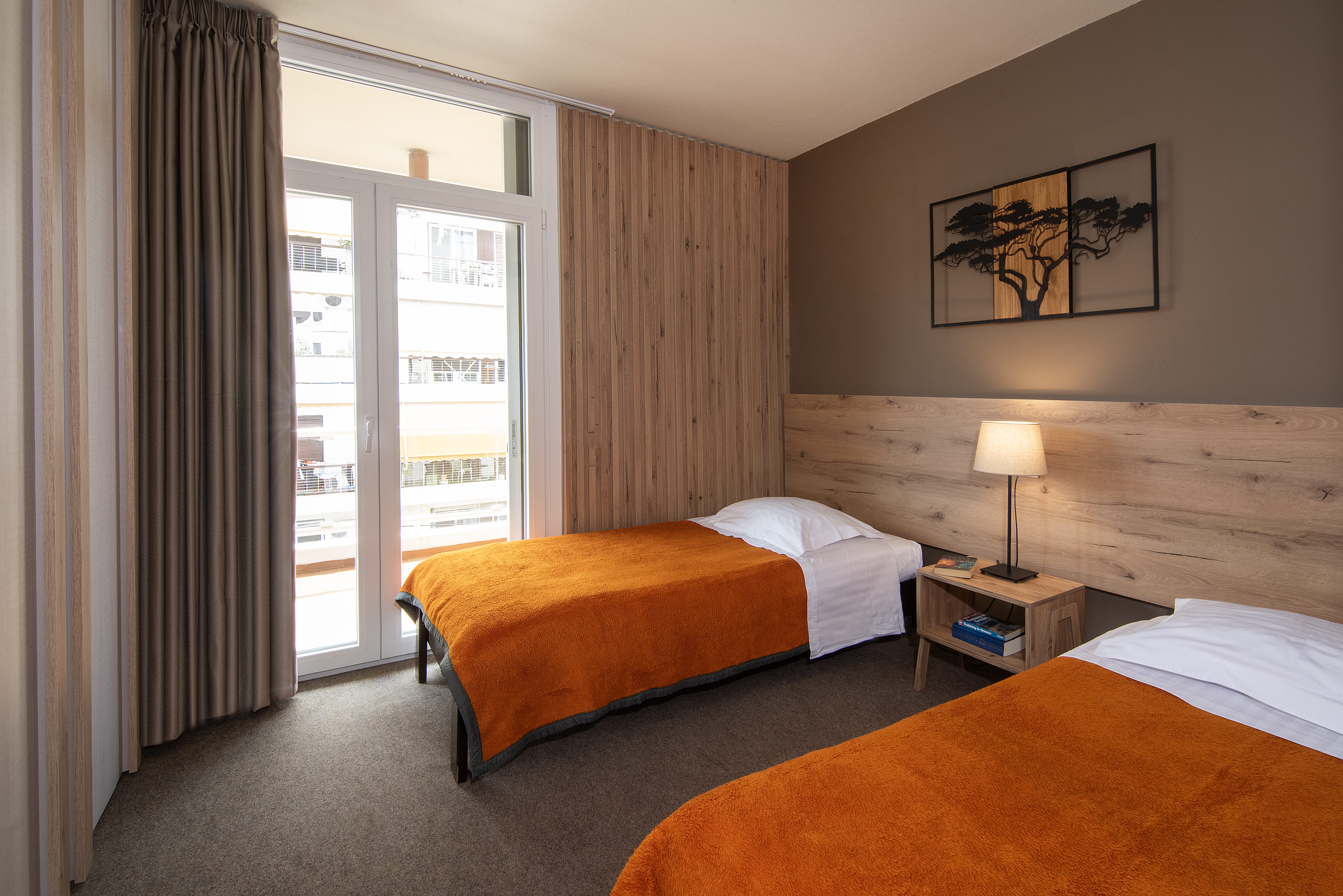 a hotel room with two beds