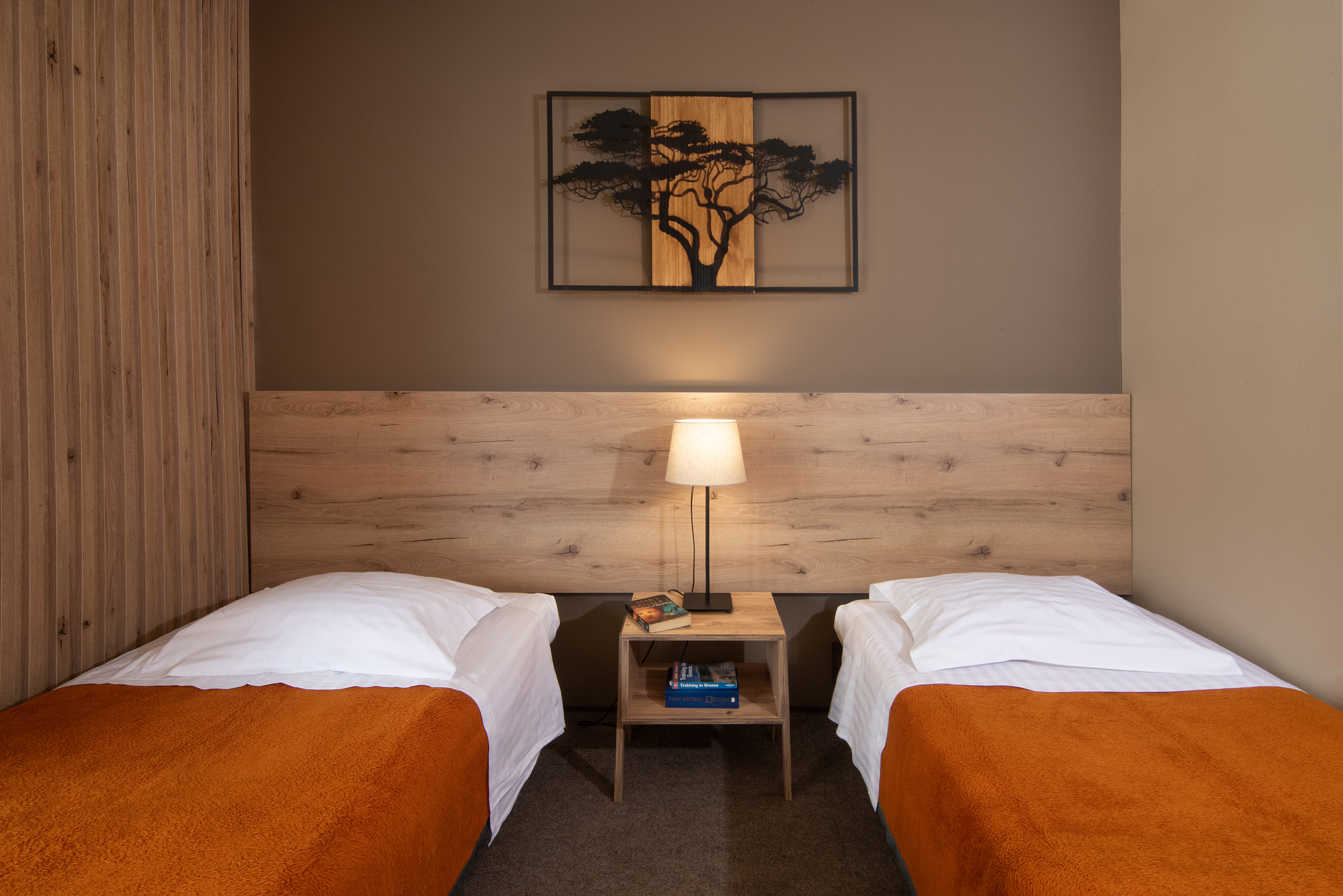 a hotel room with two beds