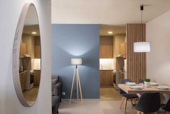 a room with a table and chairs