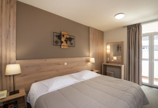 a bedroom with a large bed