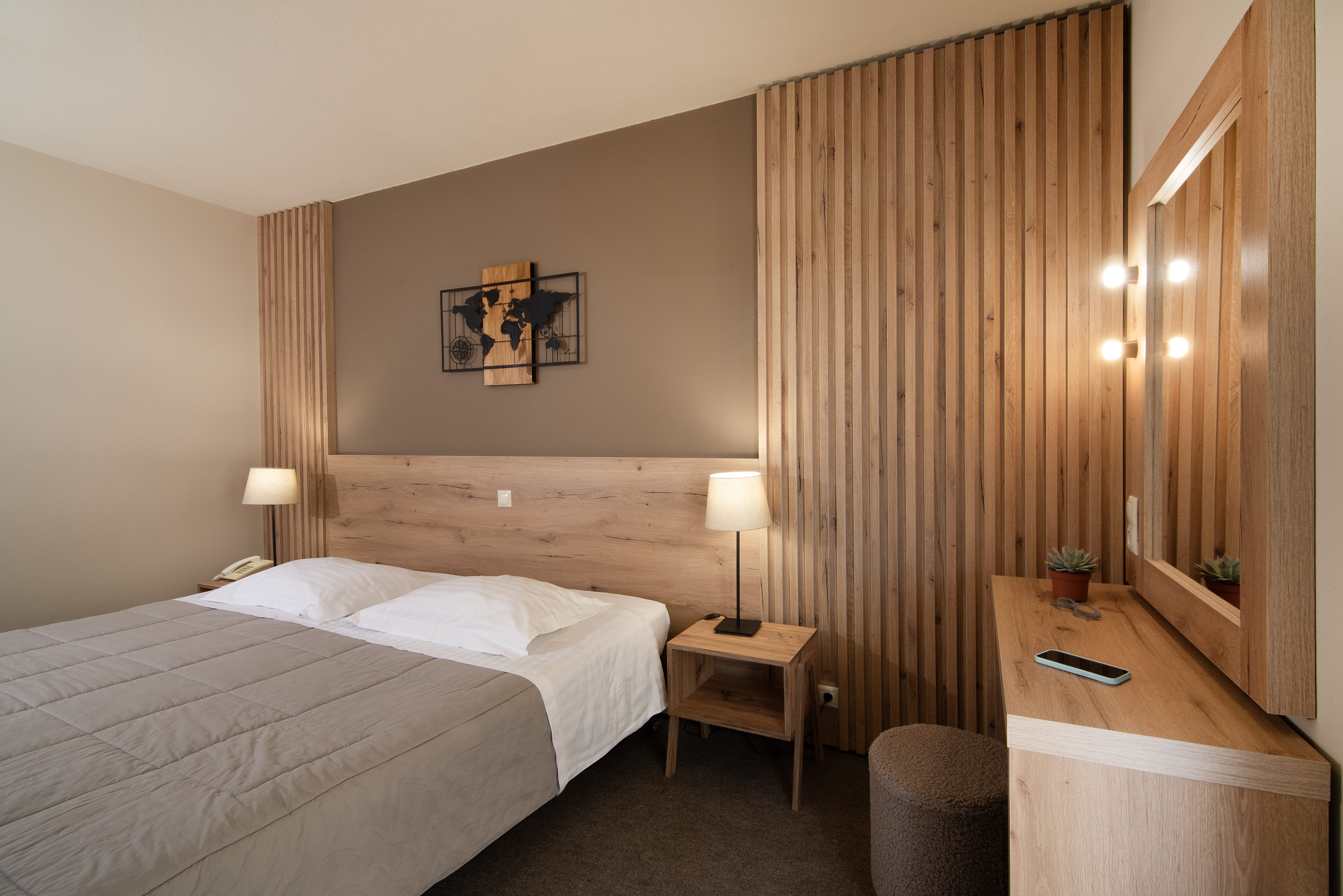 a hotel room with two beds