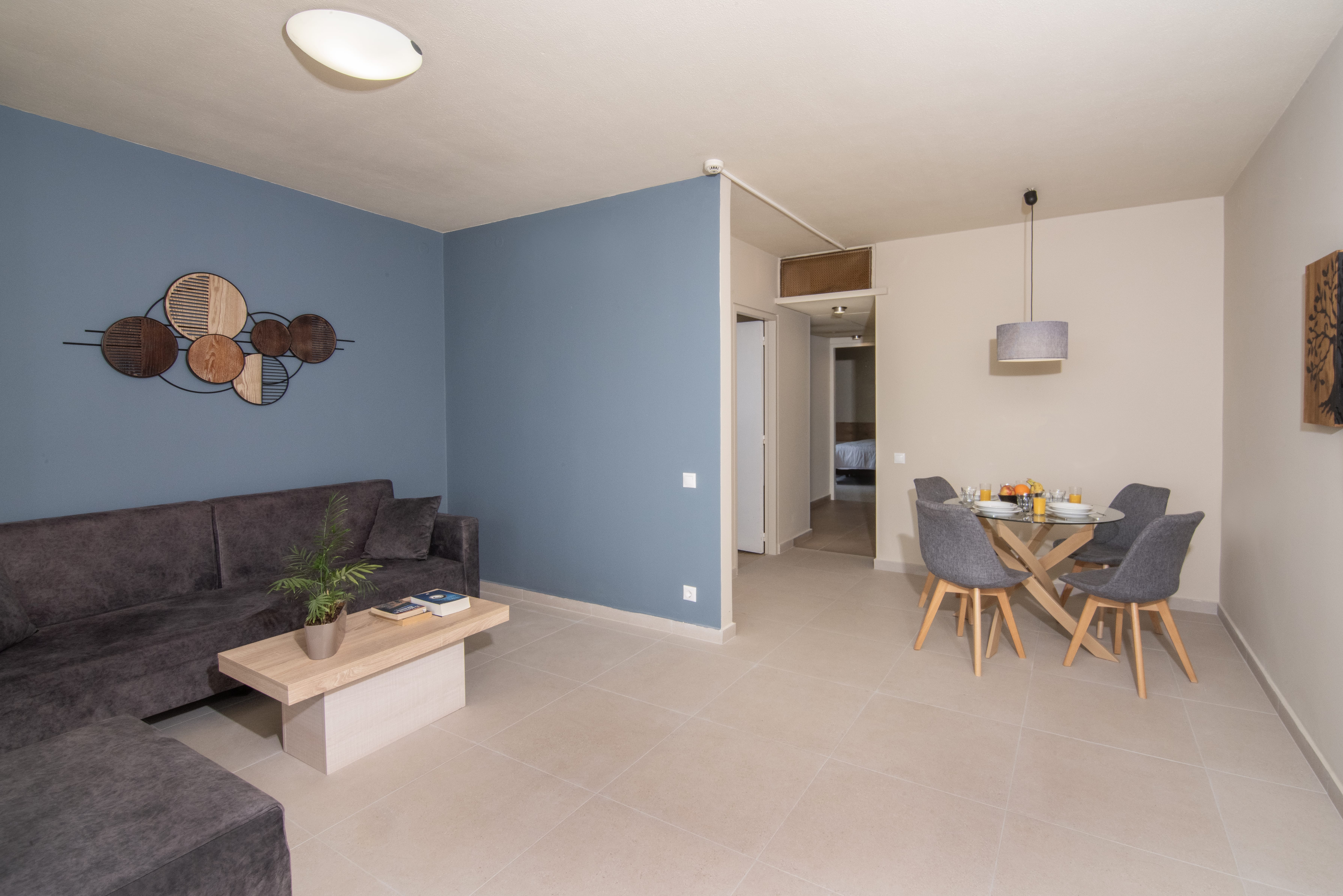 a living room with a couch and a table