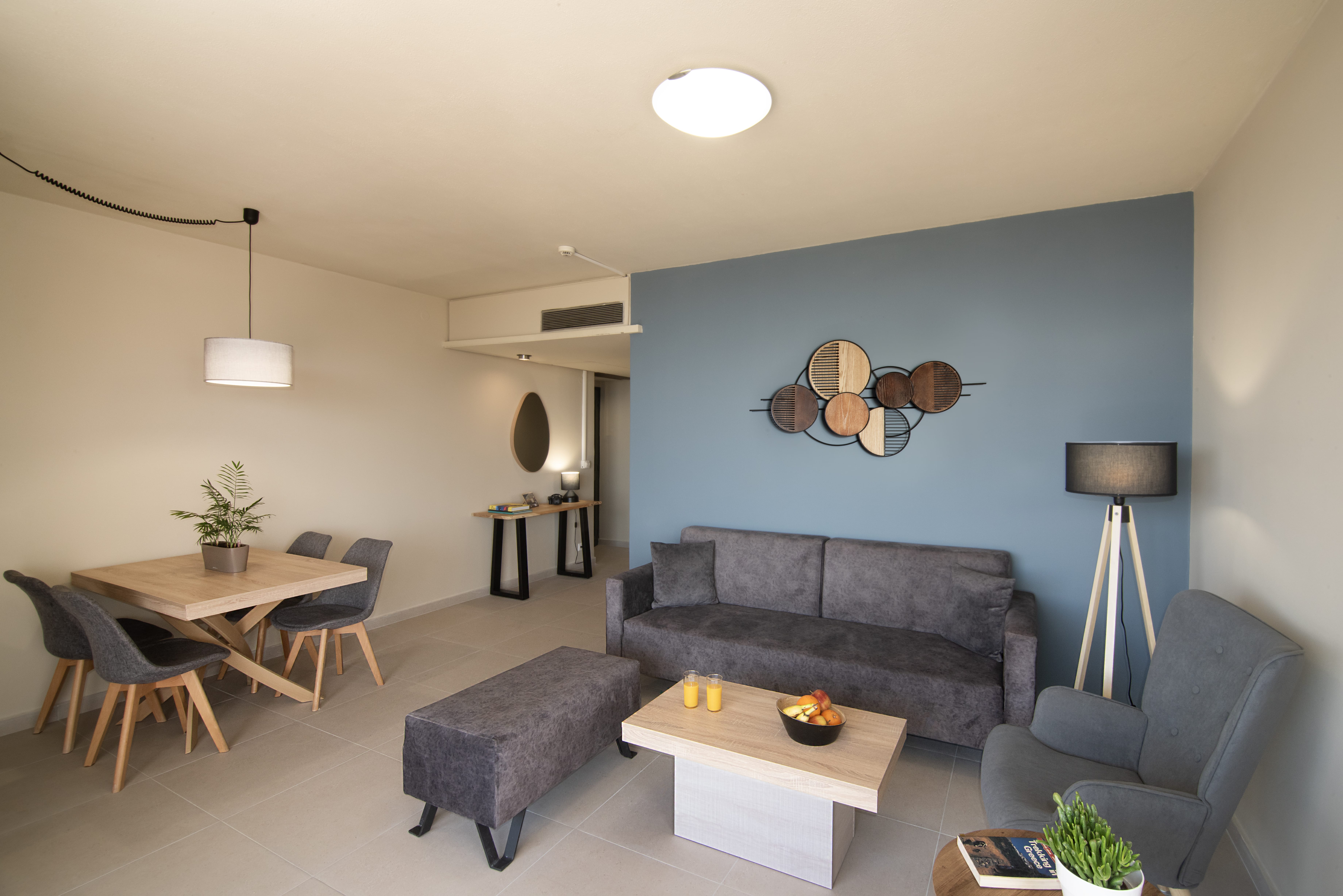 a living room with a couch and a table