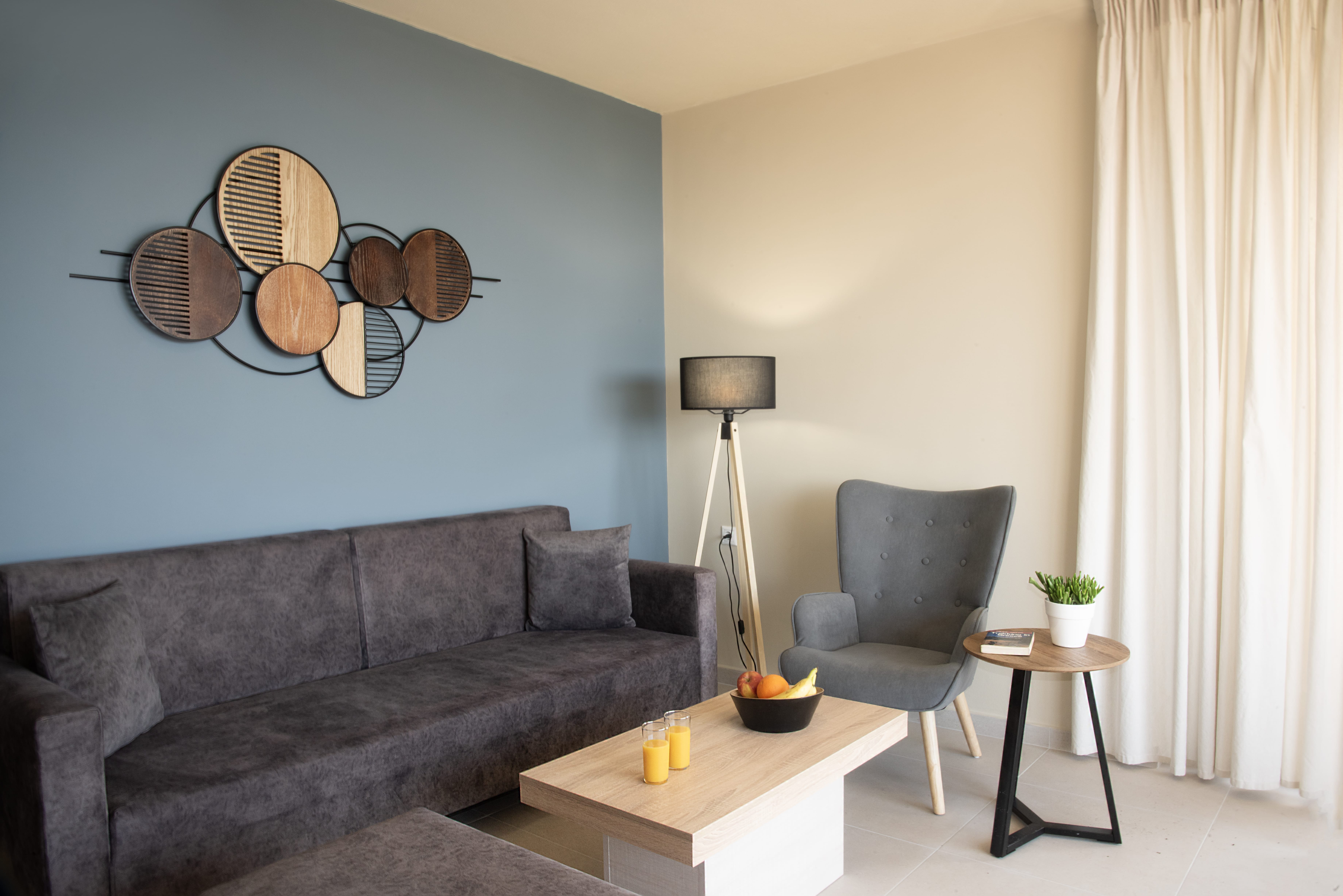 a living room with a couch and a table