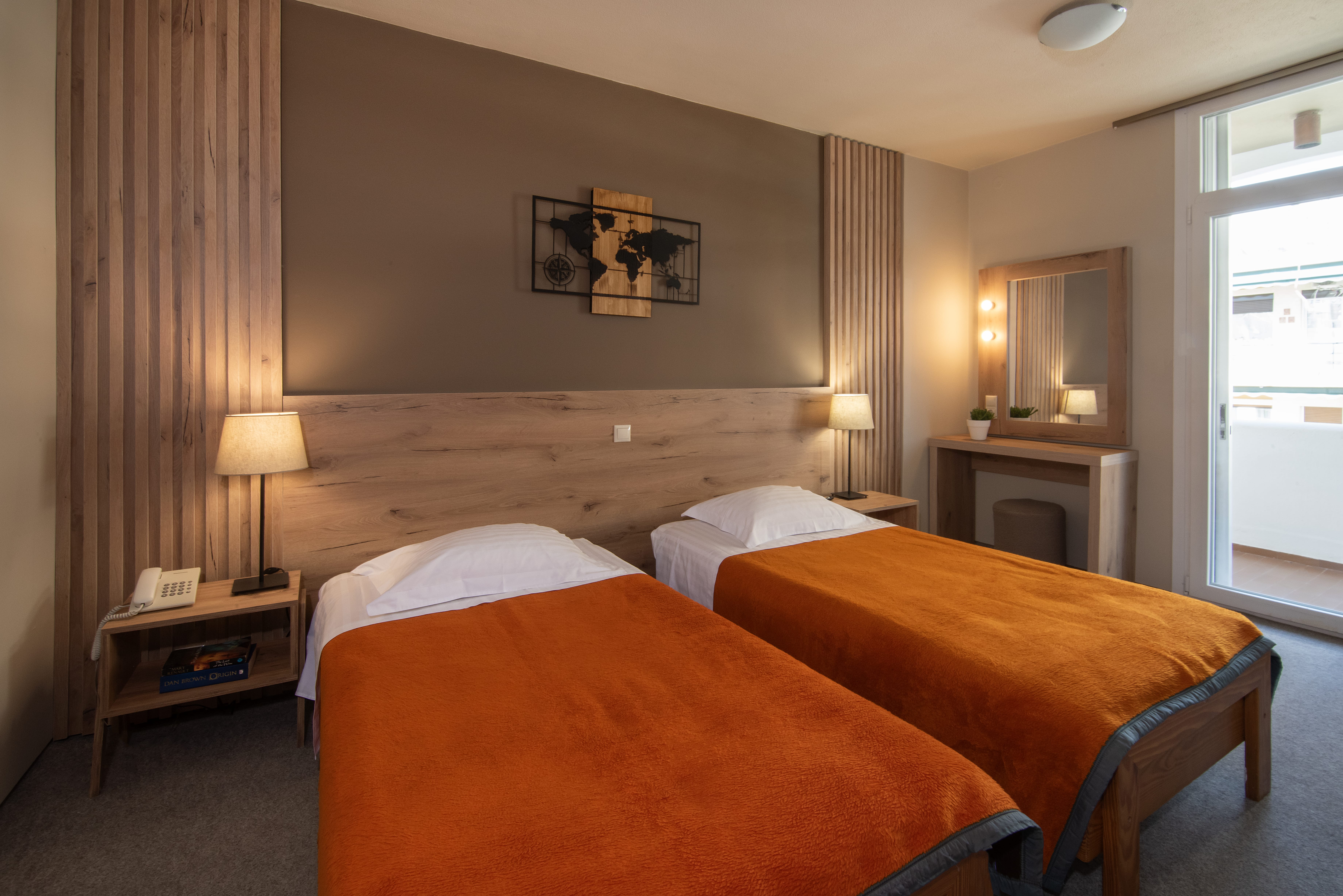 a hotel room with two beds