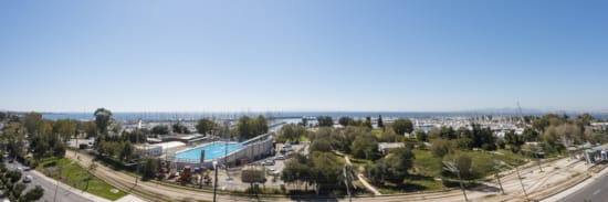 a pool surrounded by trees