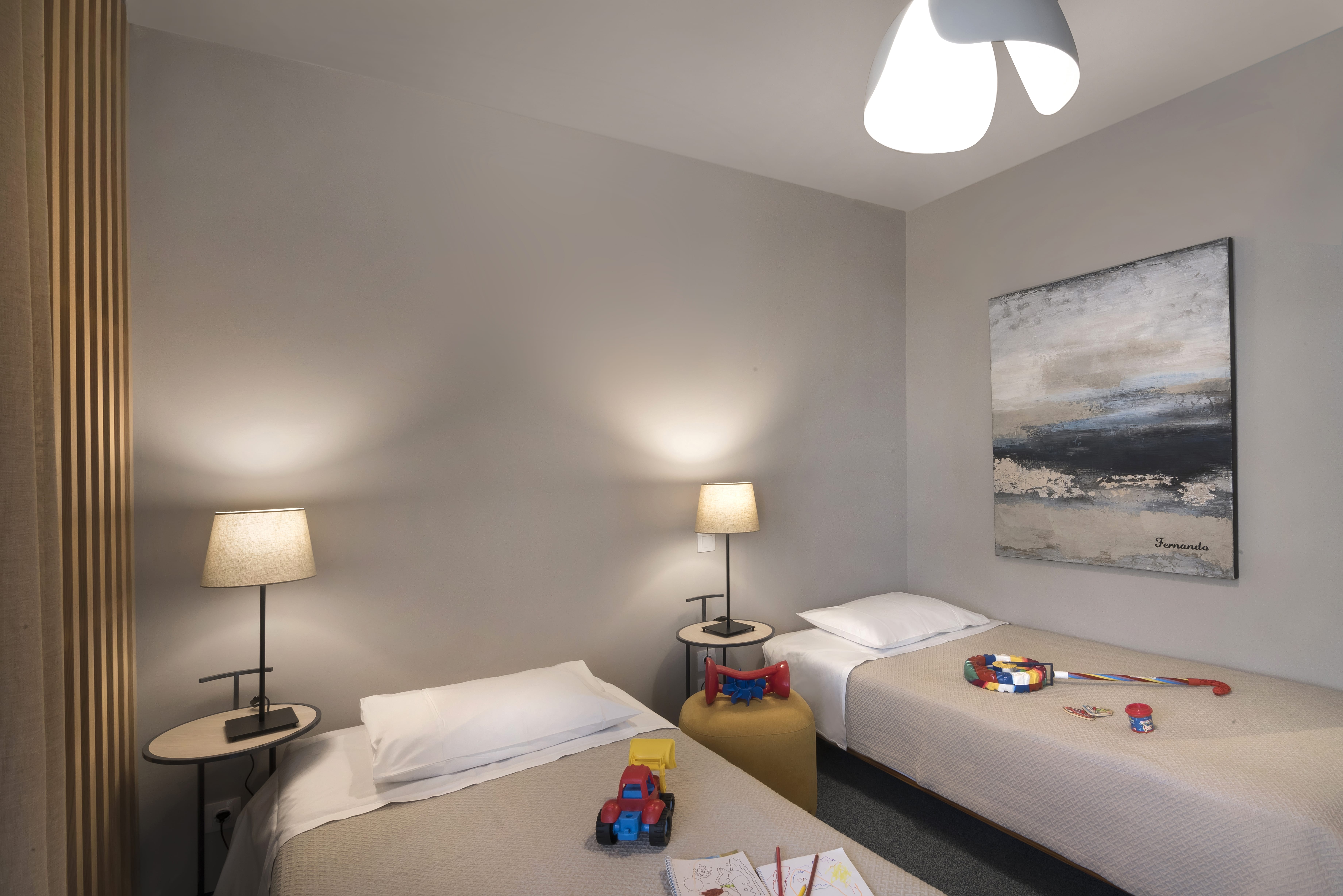 a bedroom with two beds