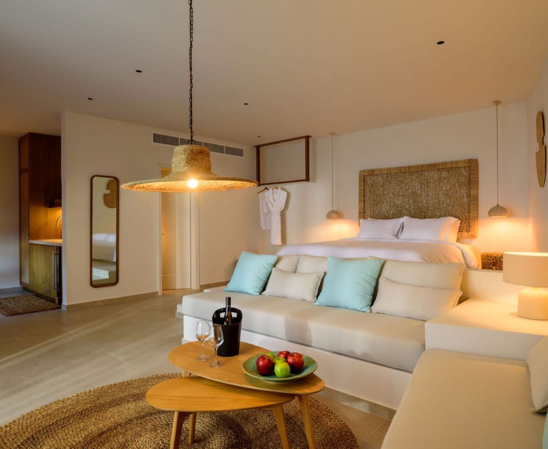 a living room with a couch and a table