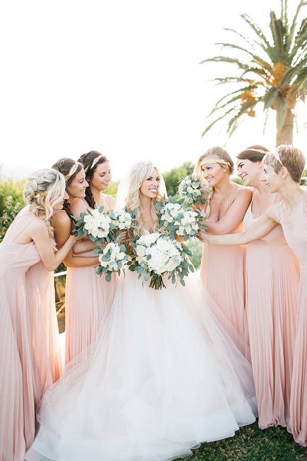 a group of people in dresses