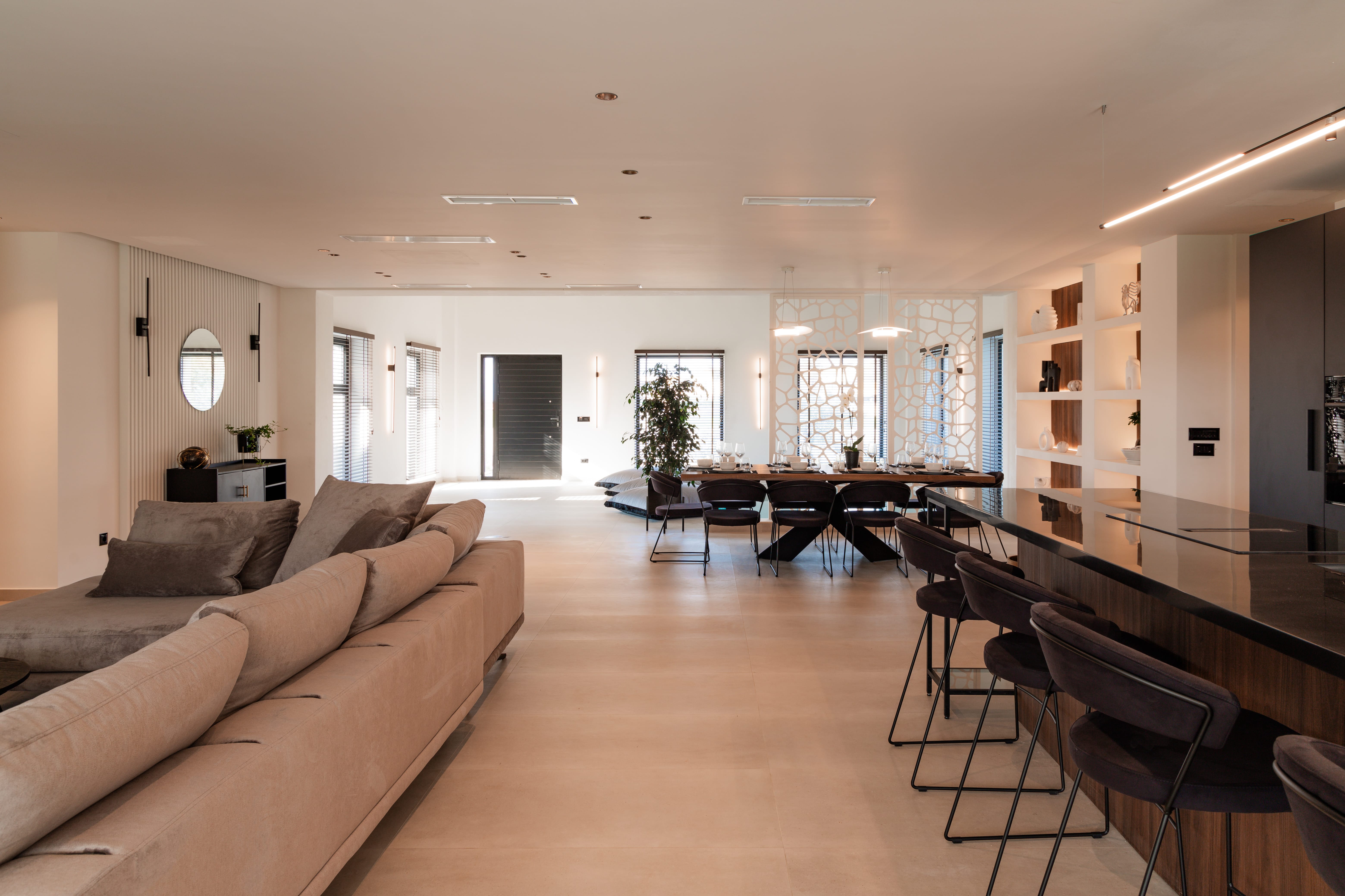 a large living room with a large kitchen and dining area