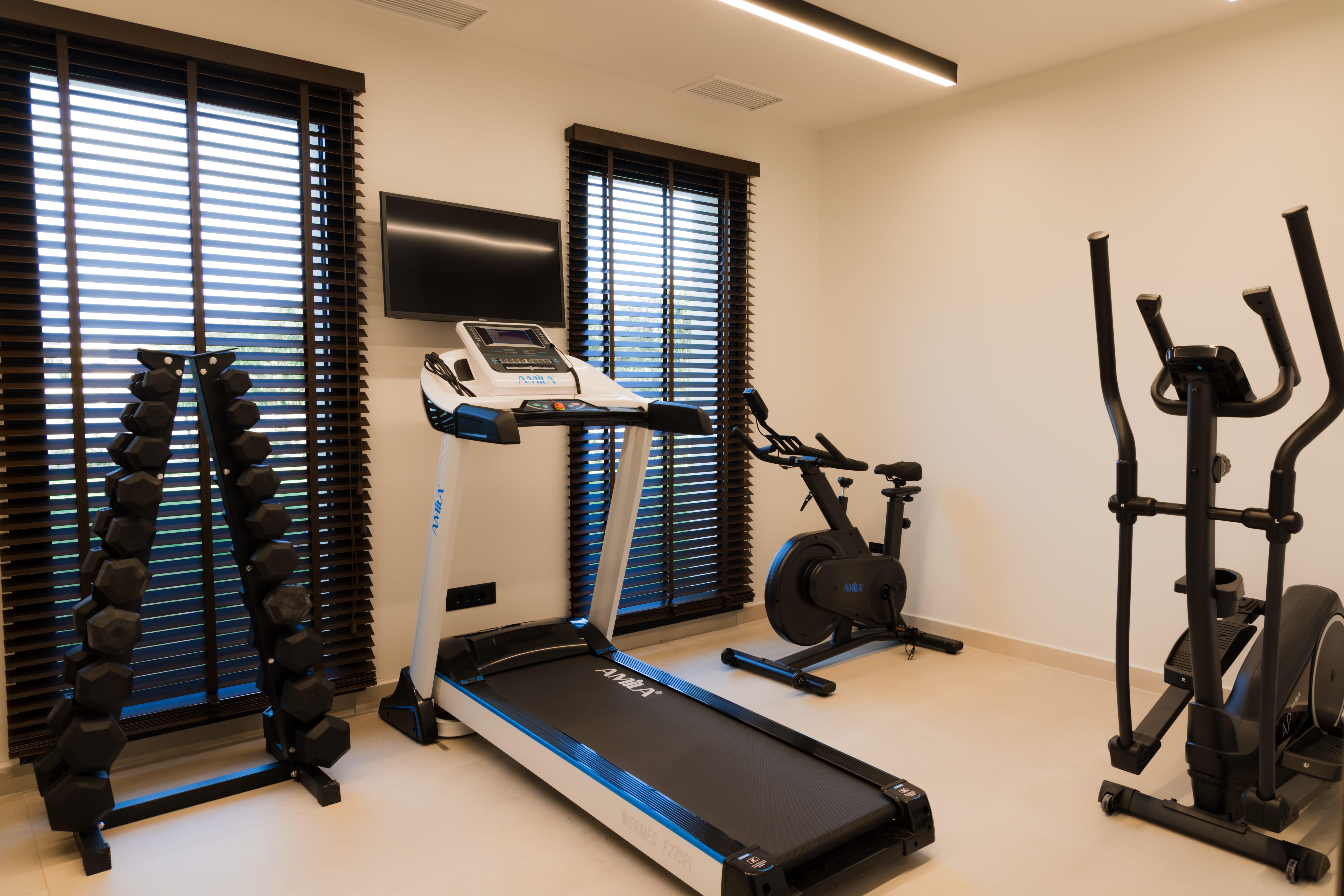 a room with a desk and a computer