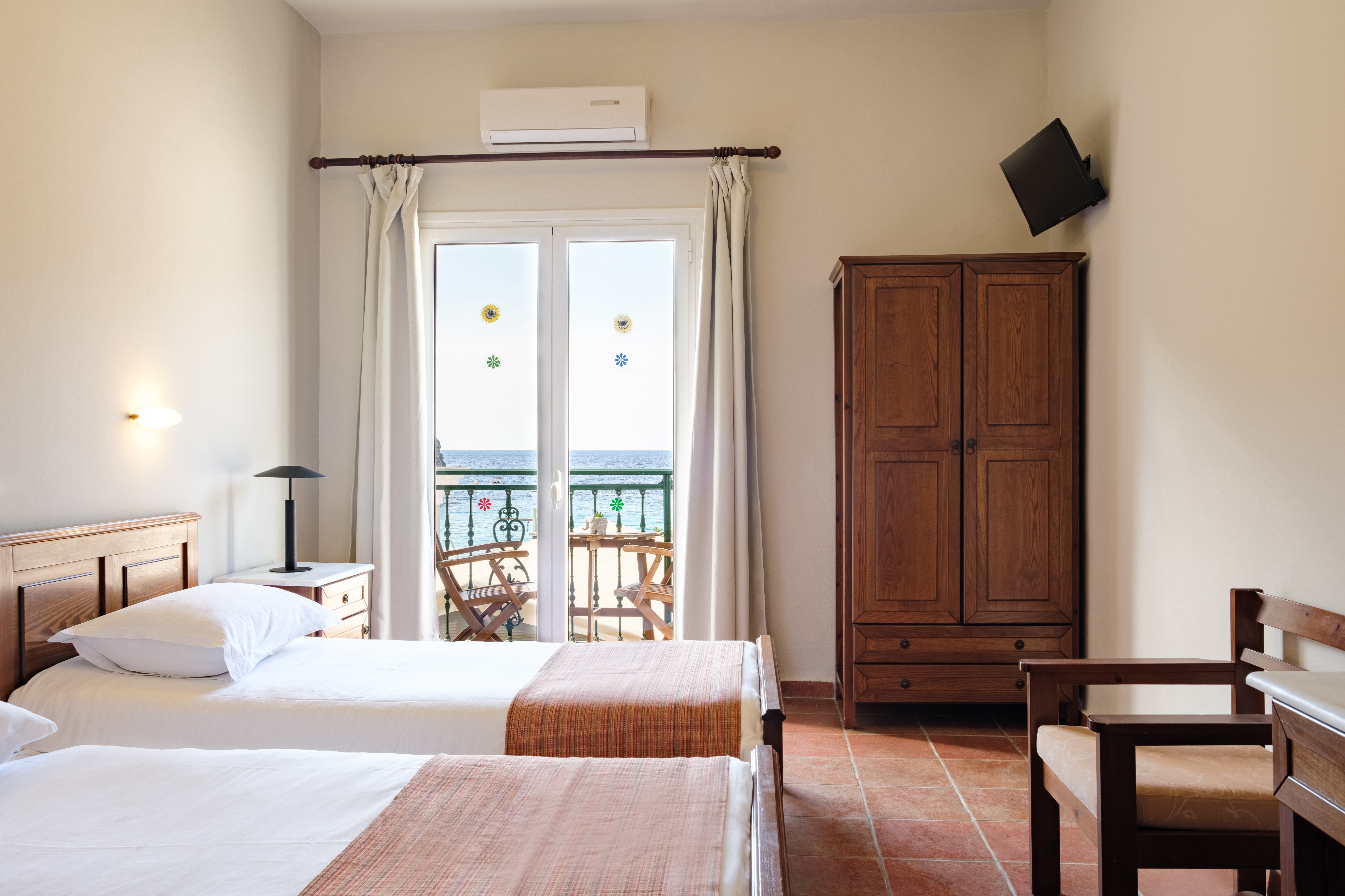 a hotel room with two beds