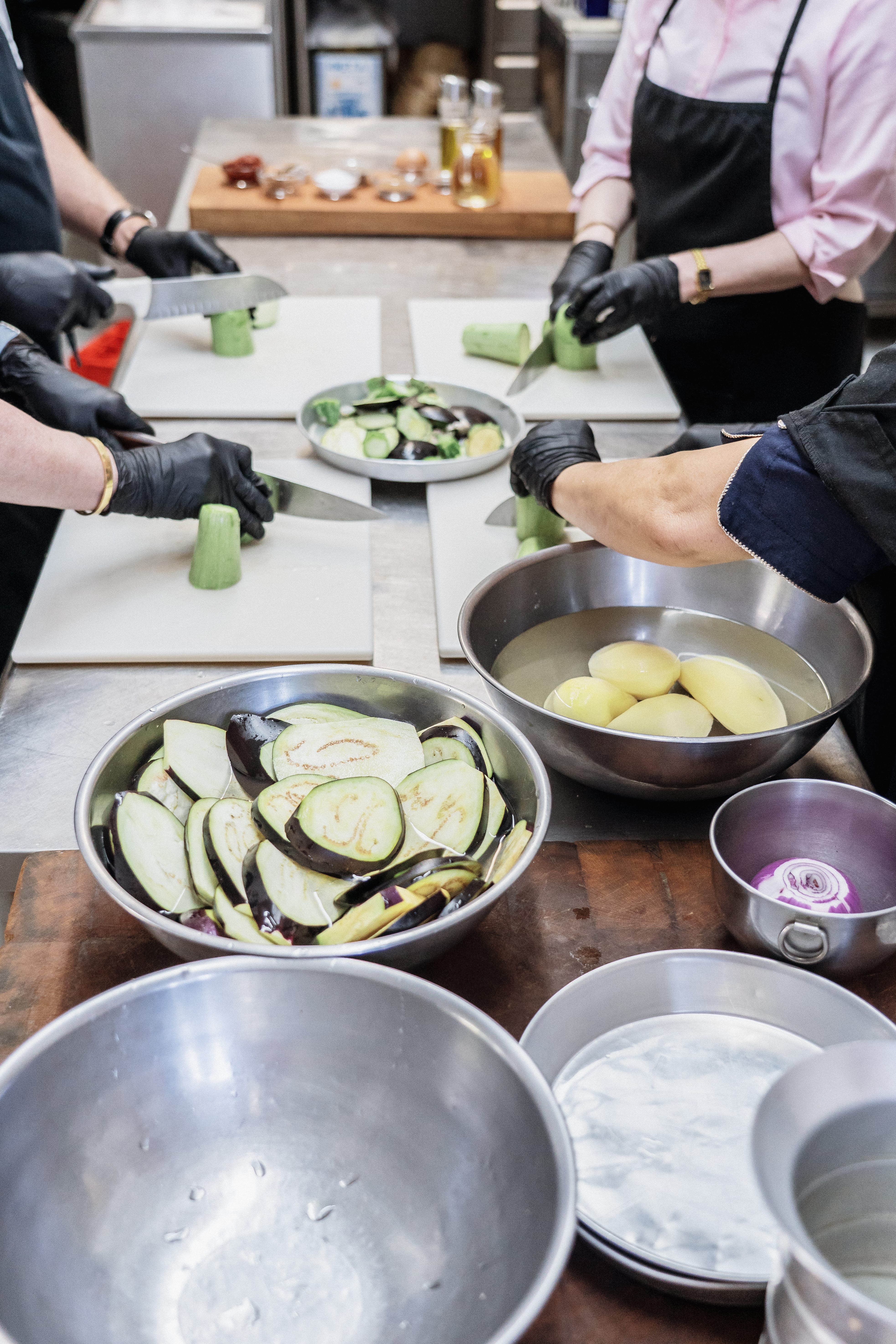 a group of people preparing food