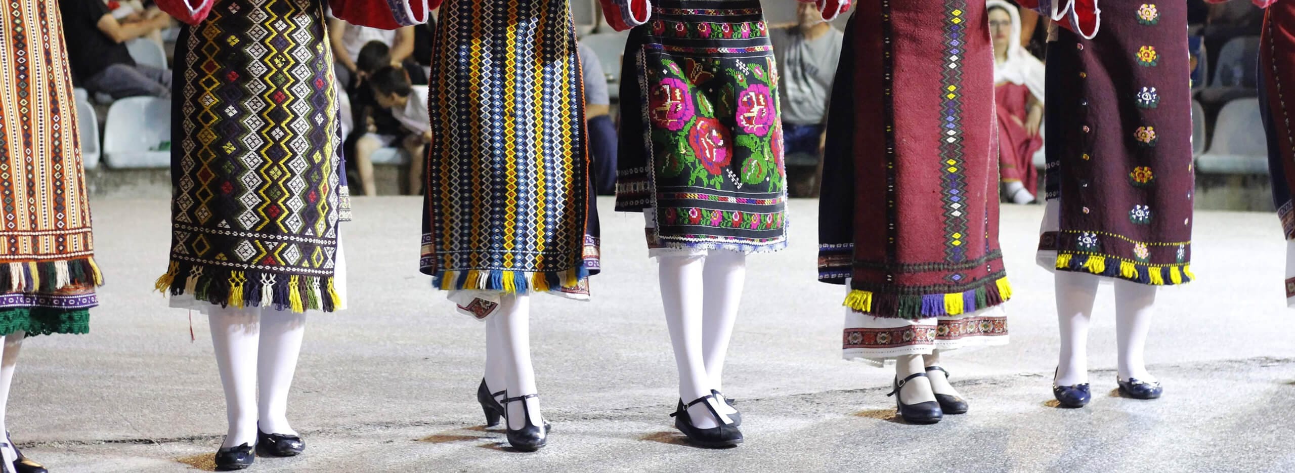 a group of mannequins wearing different outfits