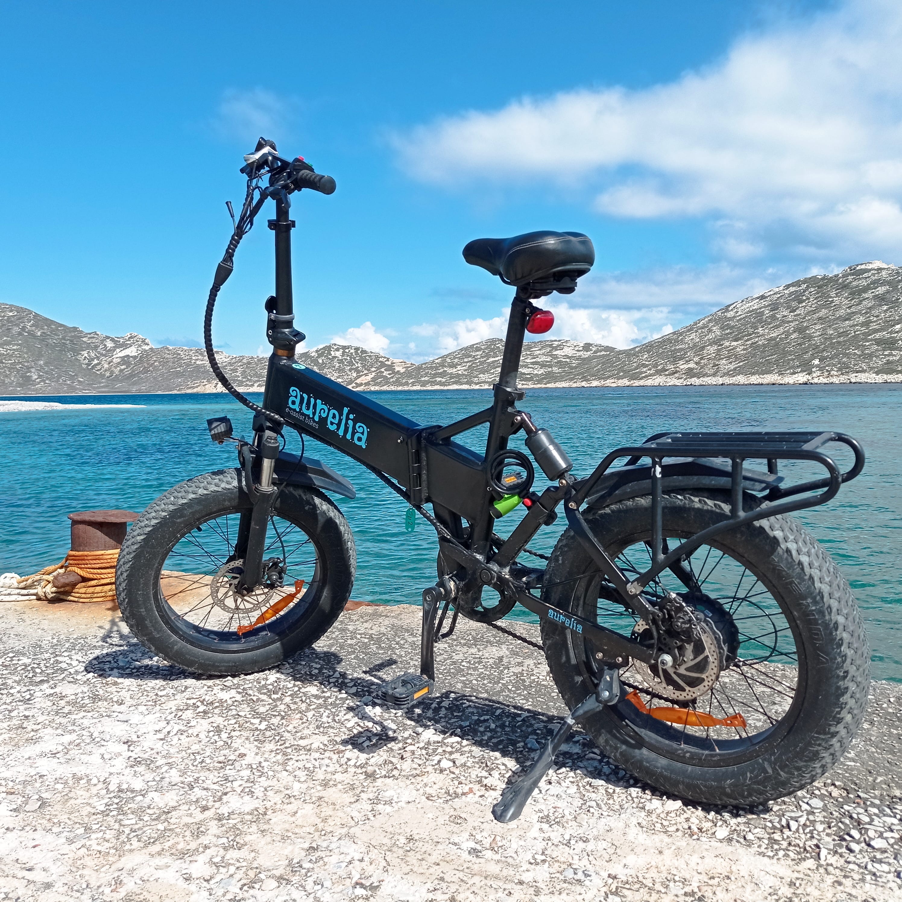 a bicycle parked on a beach