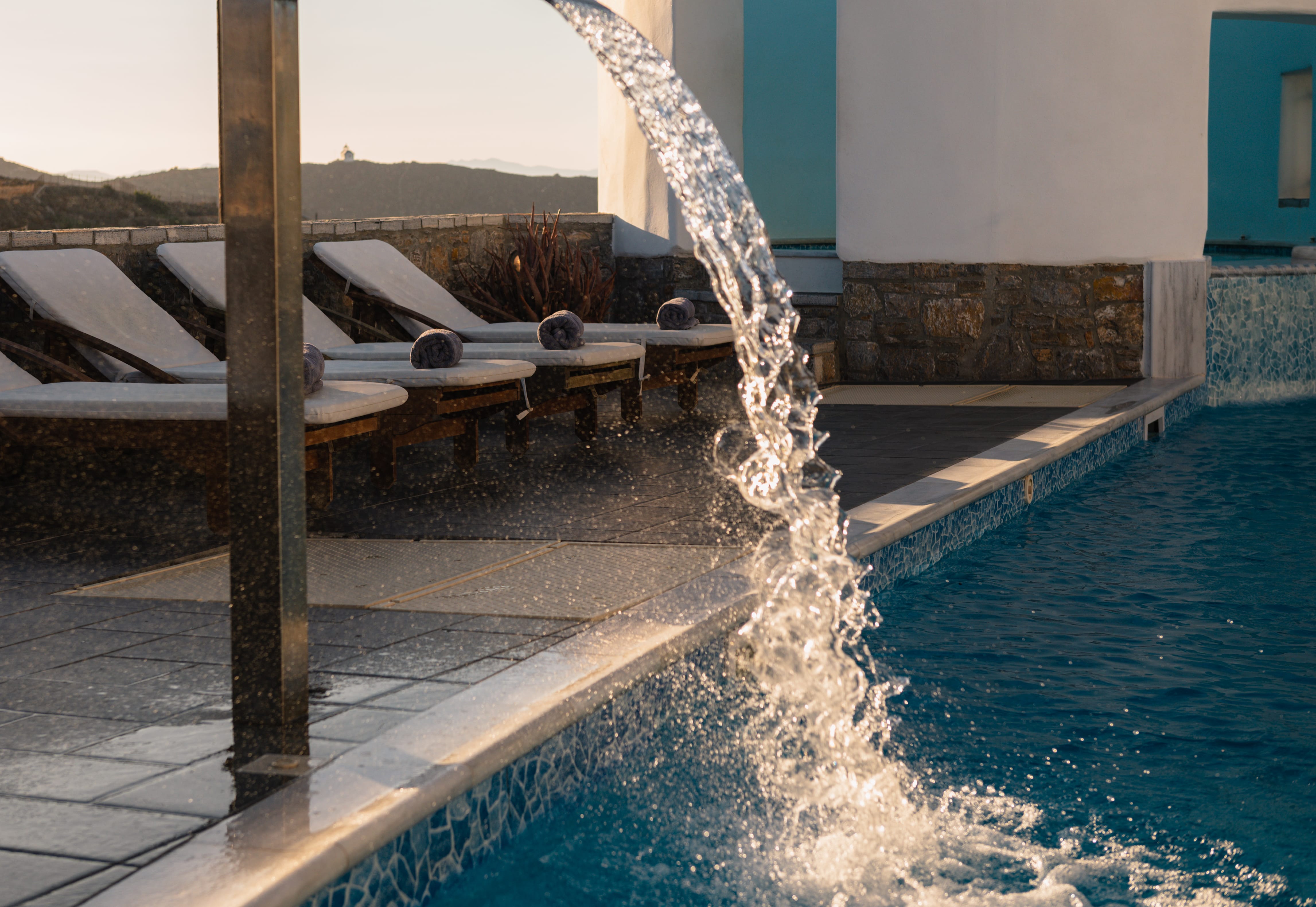 a pool with a fountain