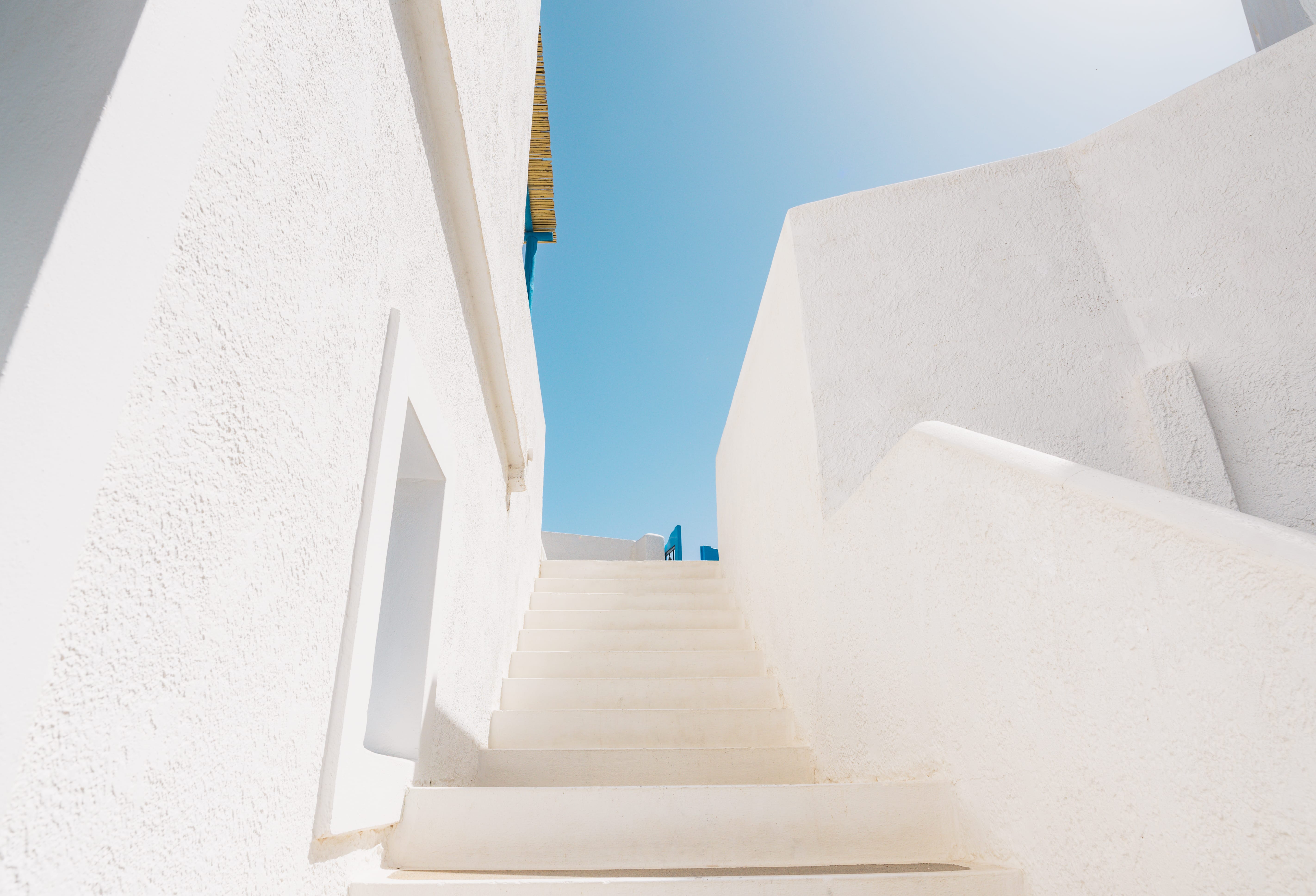 a white staircase in a house