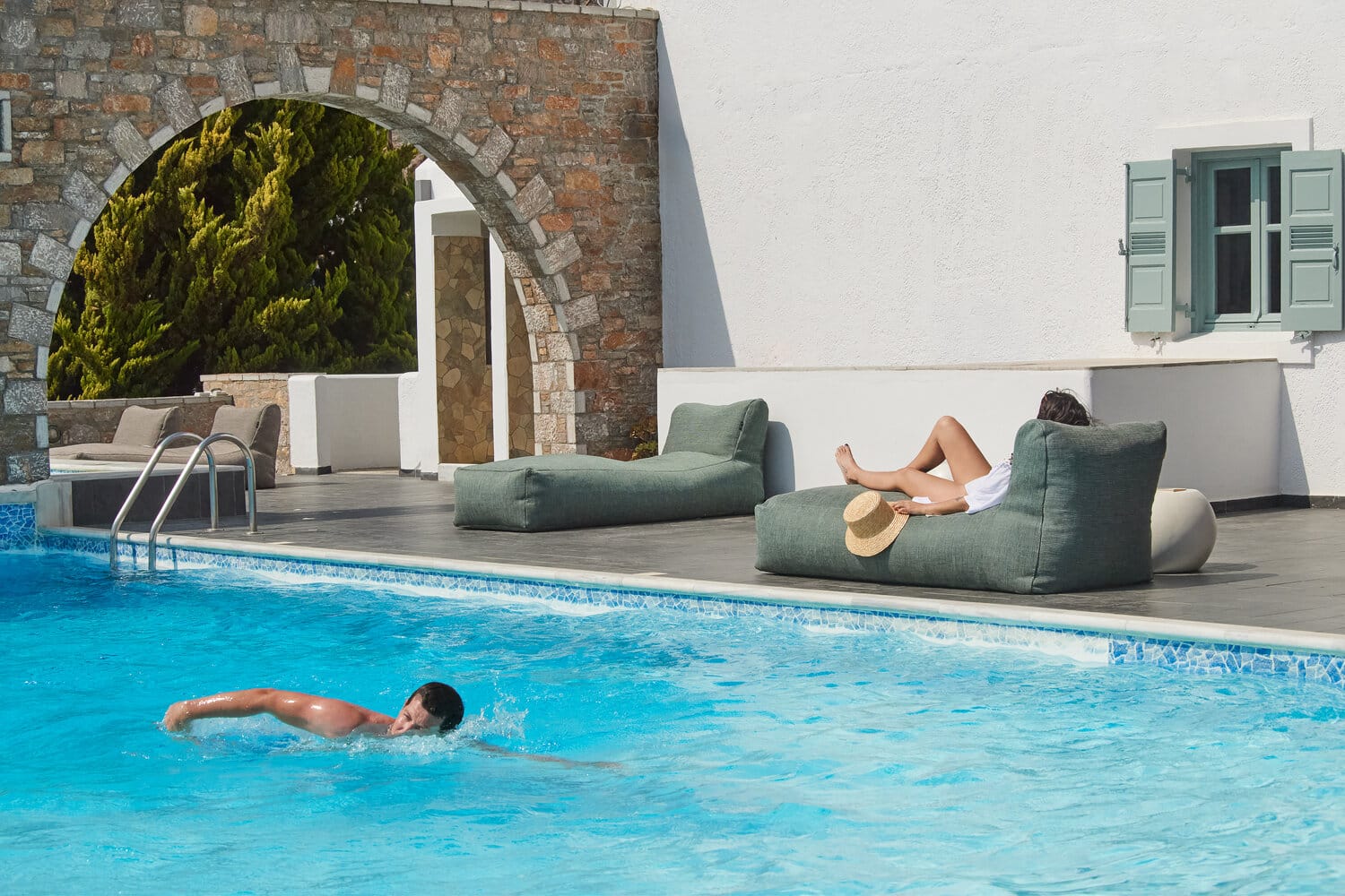 a person swimming in a pool