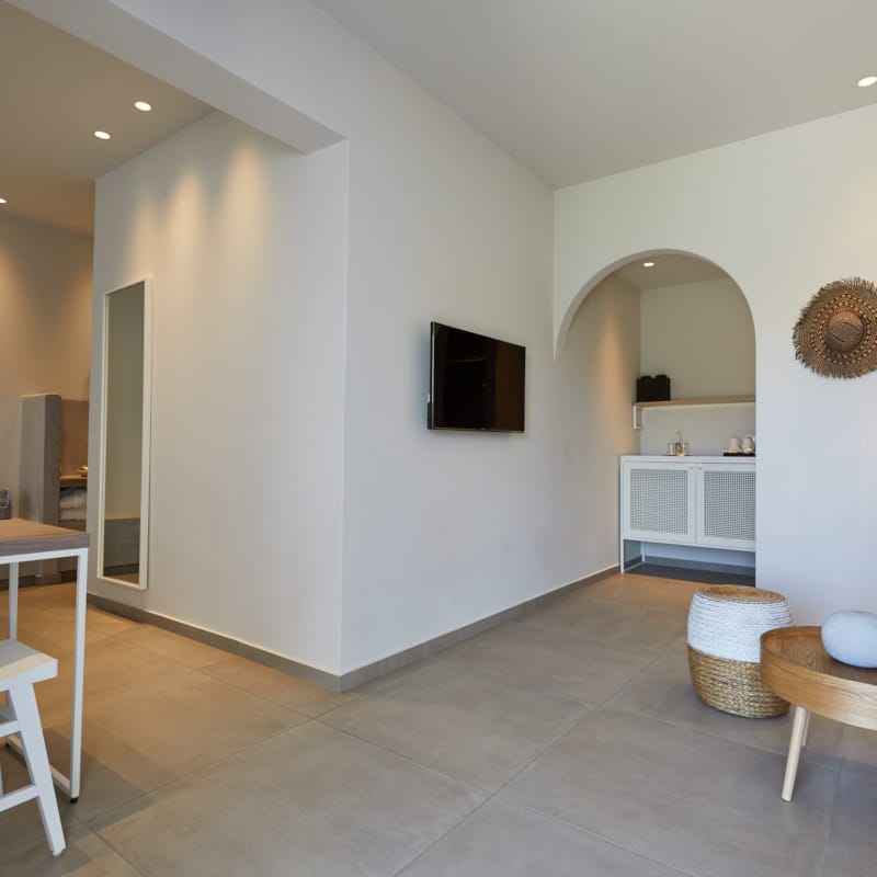 a room with a table and chairs