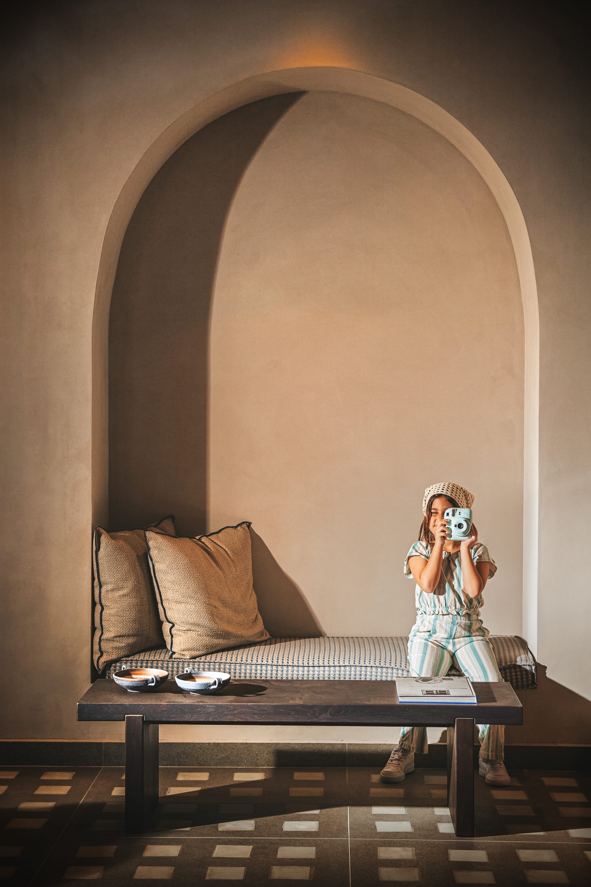 a child taking a picture of herself