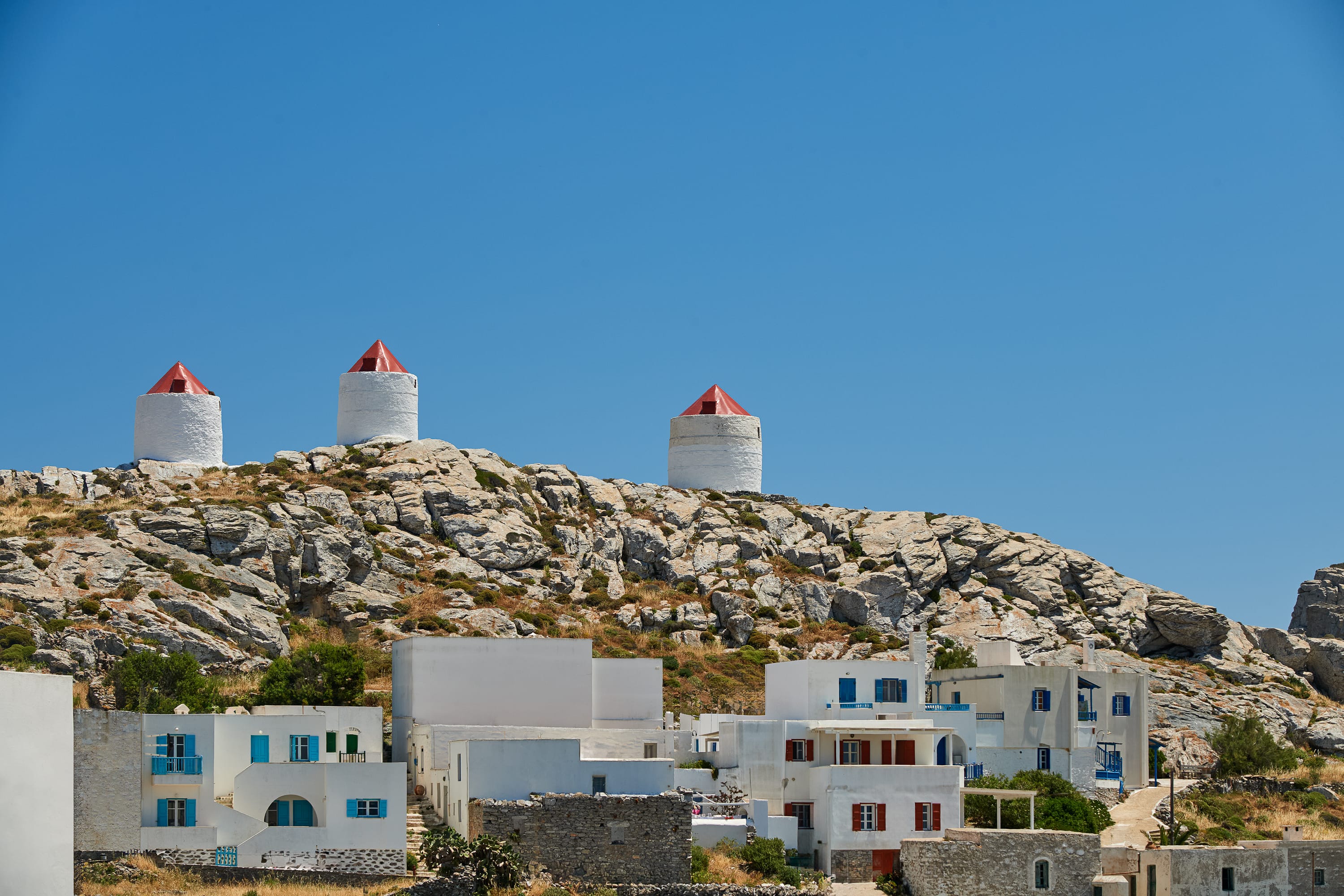 a white buildings on a hill