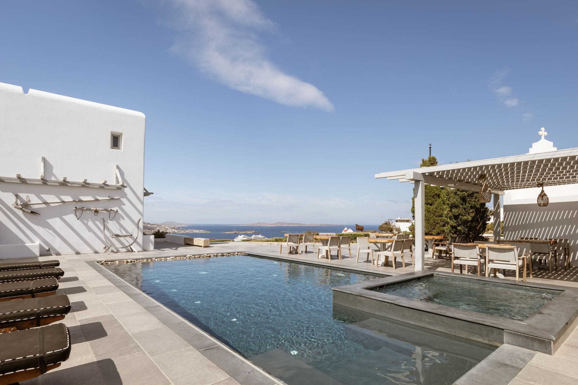 a pool with a building in the background