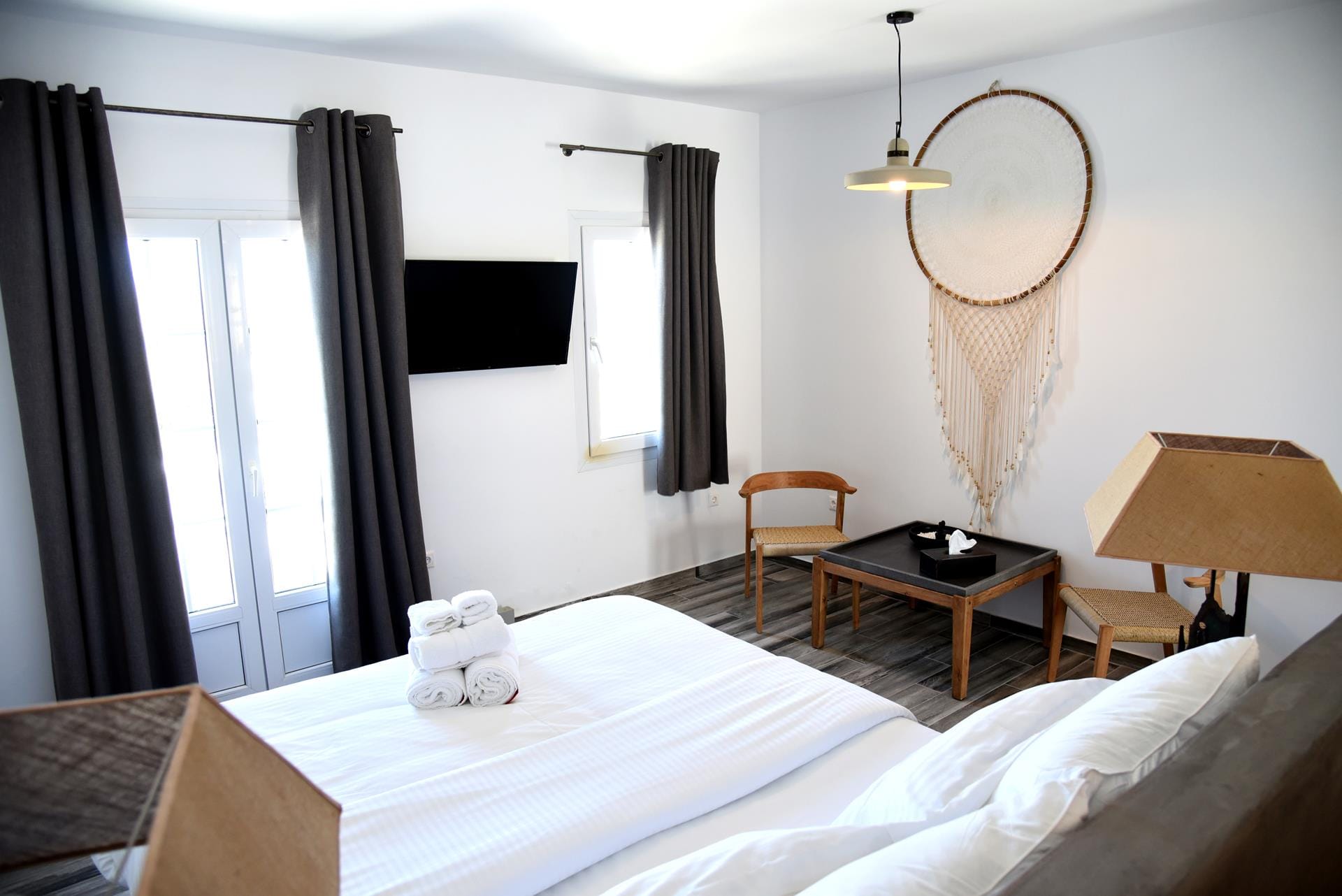 a bedroom with a bed and a table