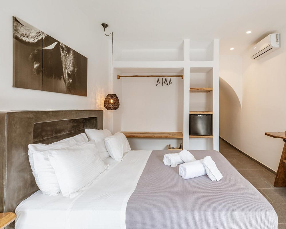 a bed with white sheets