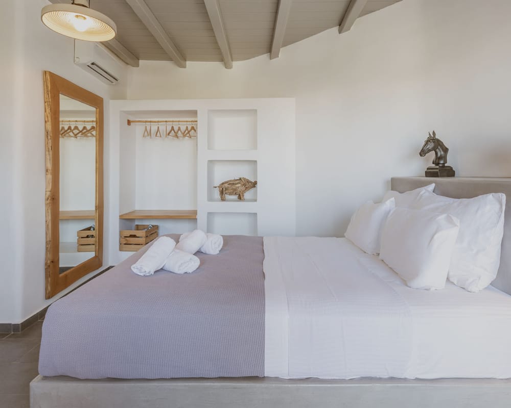 a bedroom with two beds